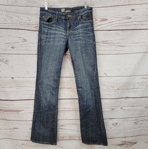 Kut from the Kloth medium wash bootcut jeans with back pocket accent
